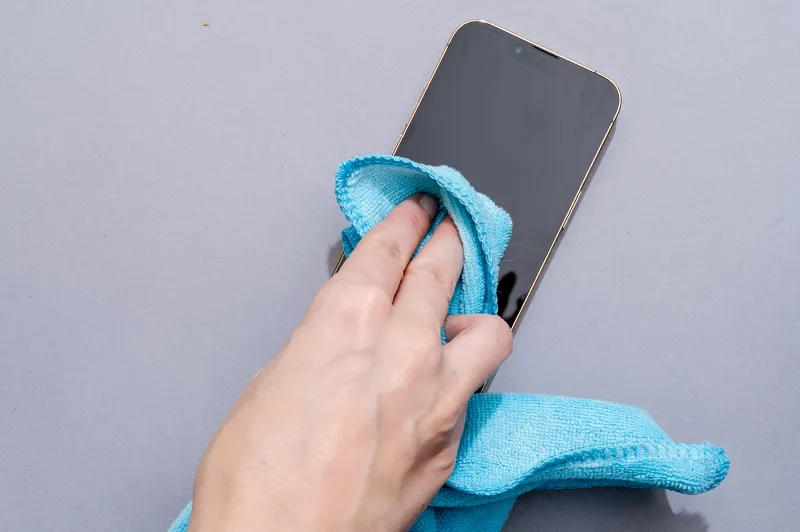 Wipe the phone with a dry towel
